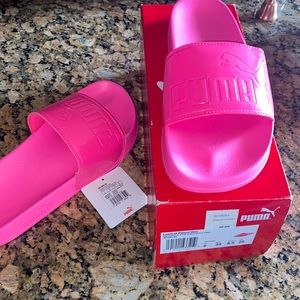 KnockOut pink patent woman’s Puma slides